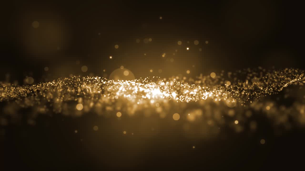 Image of gold glitter on a dark background