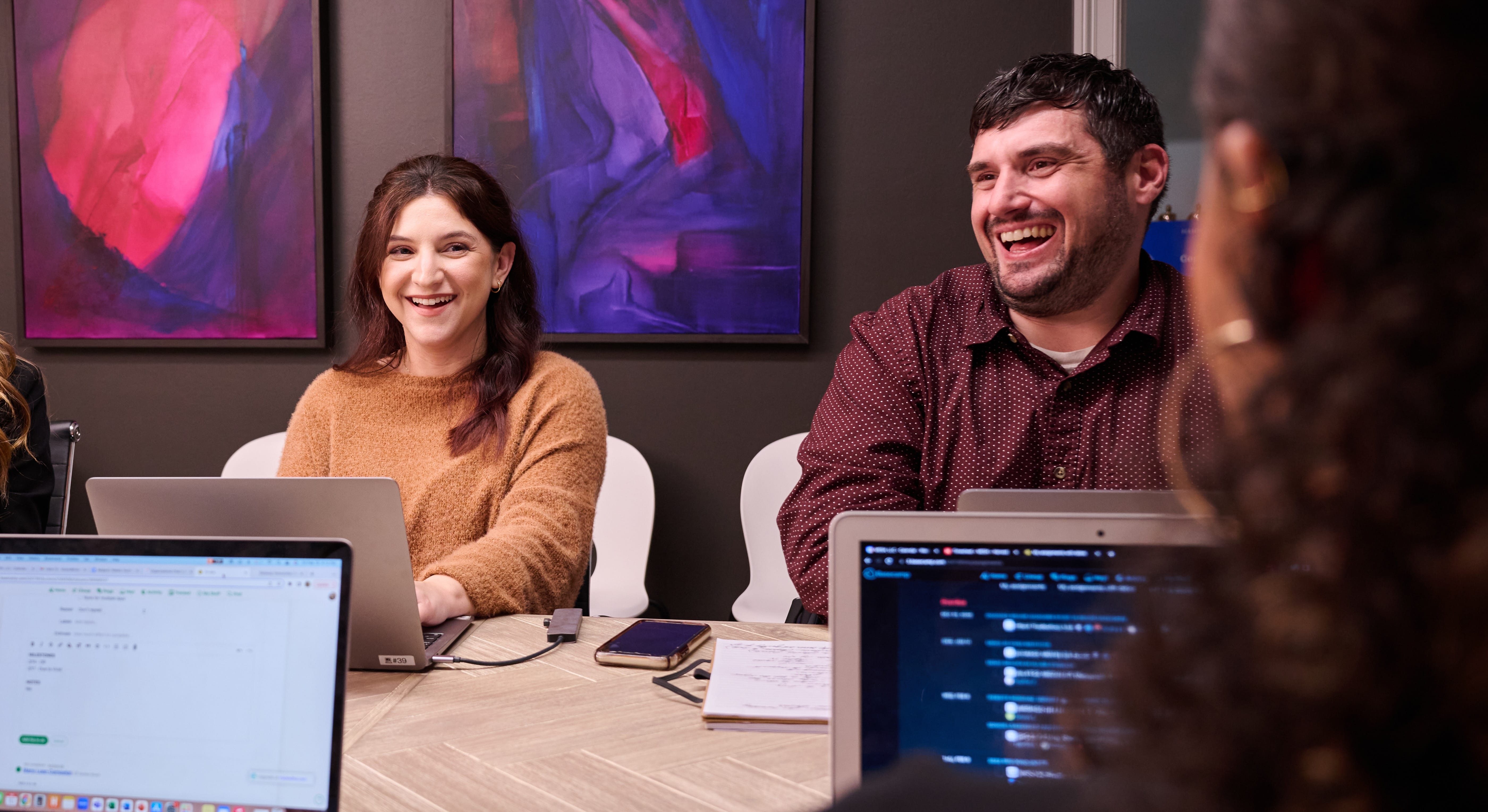 Two people in a casual business meeting