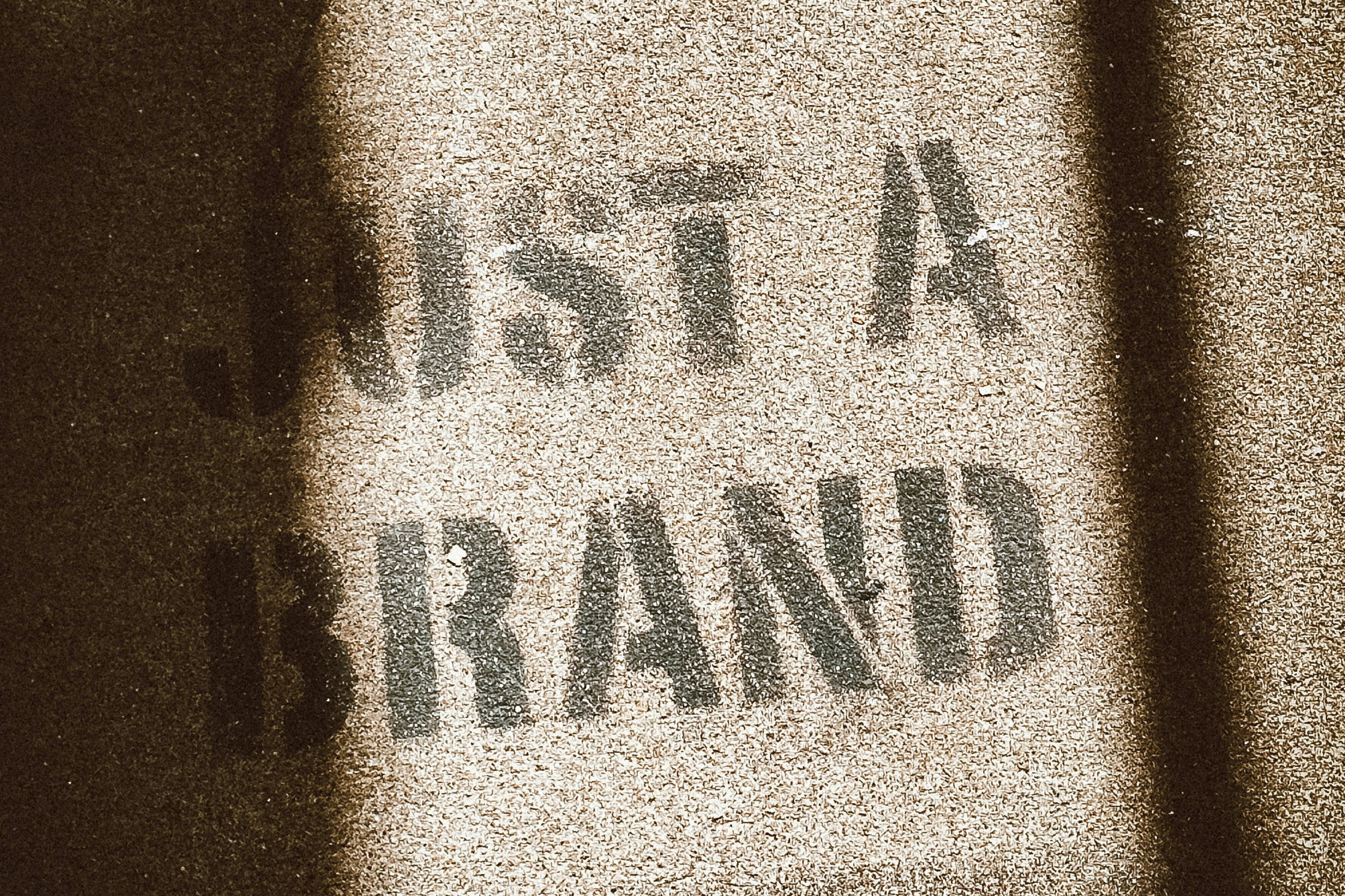 the words "just a brand" on a sign