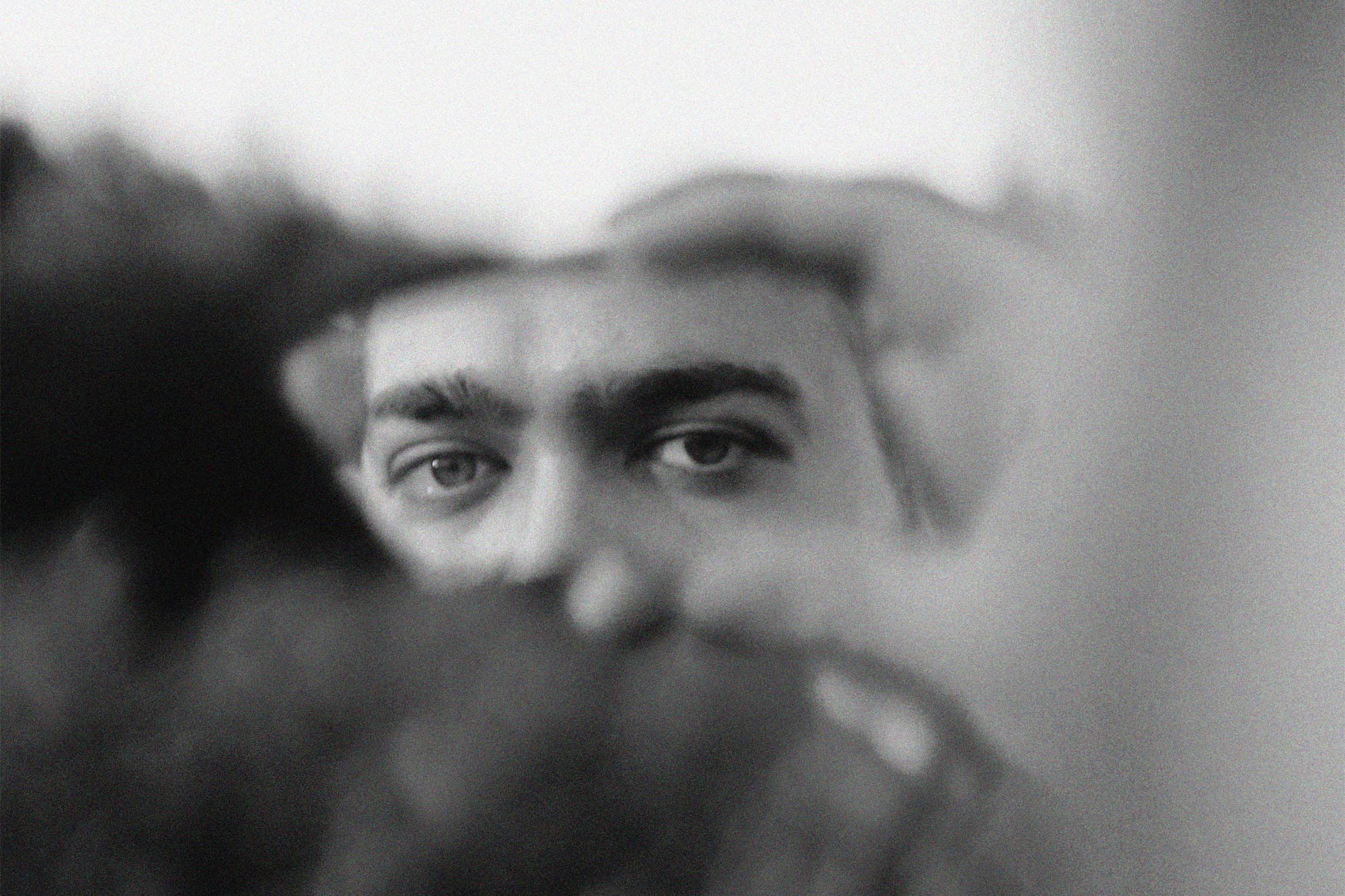 A person getting a glimpse of their reflection