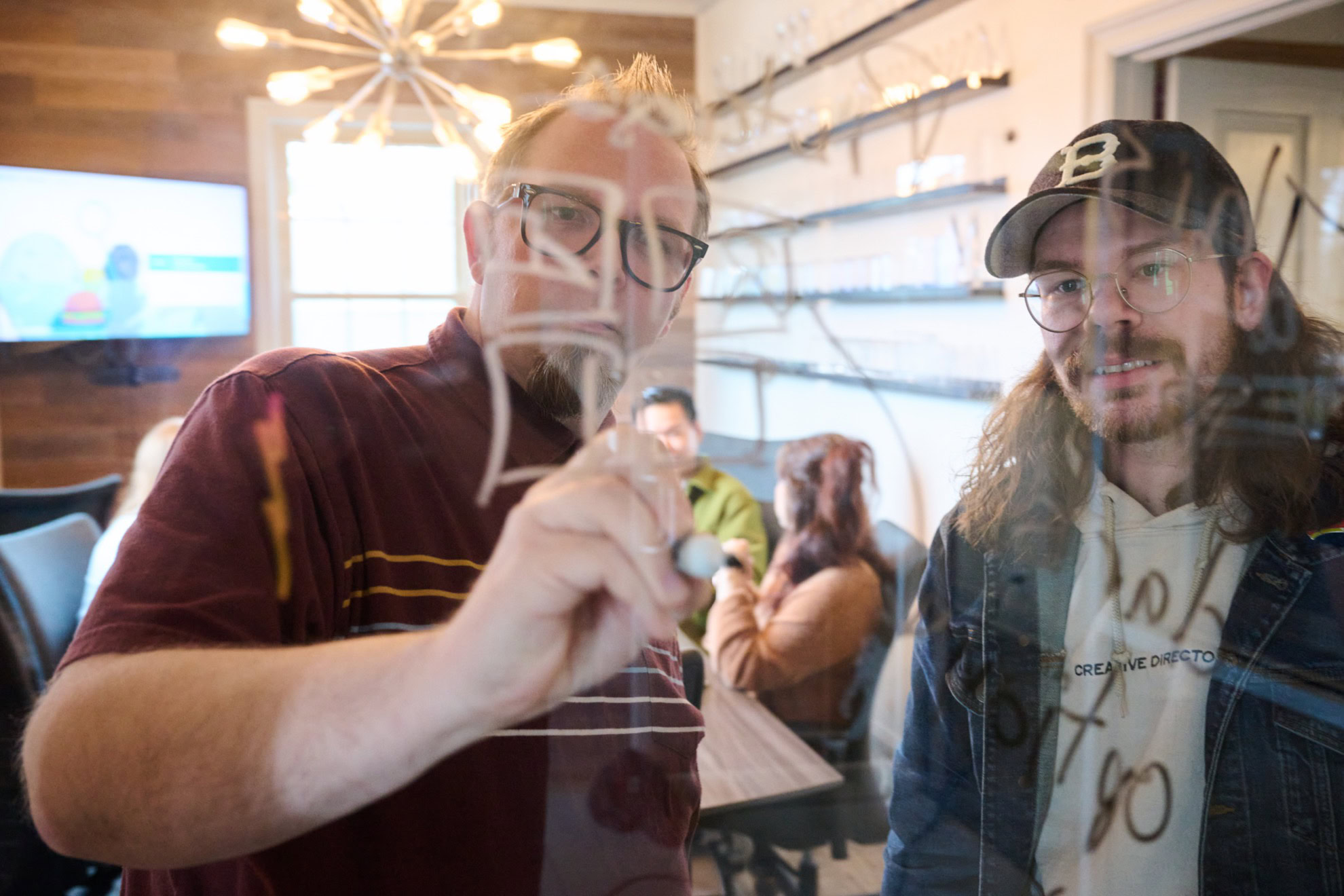 Two Team Members Collaborating